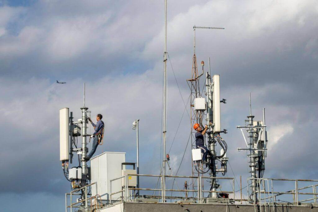 Technician Installing ISP Towers