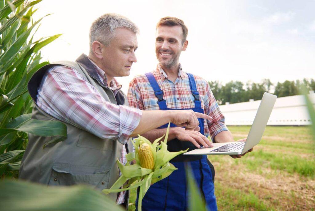 Rural Farmer Learning Networking on Laptop | ISP Revolution