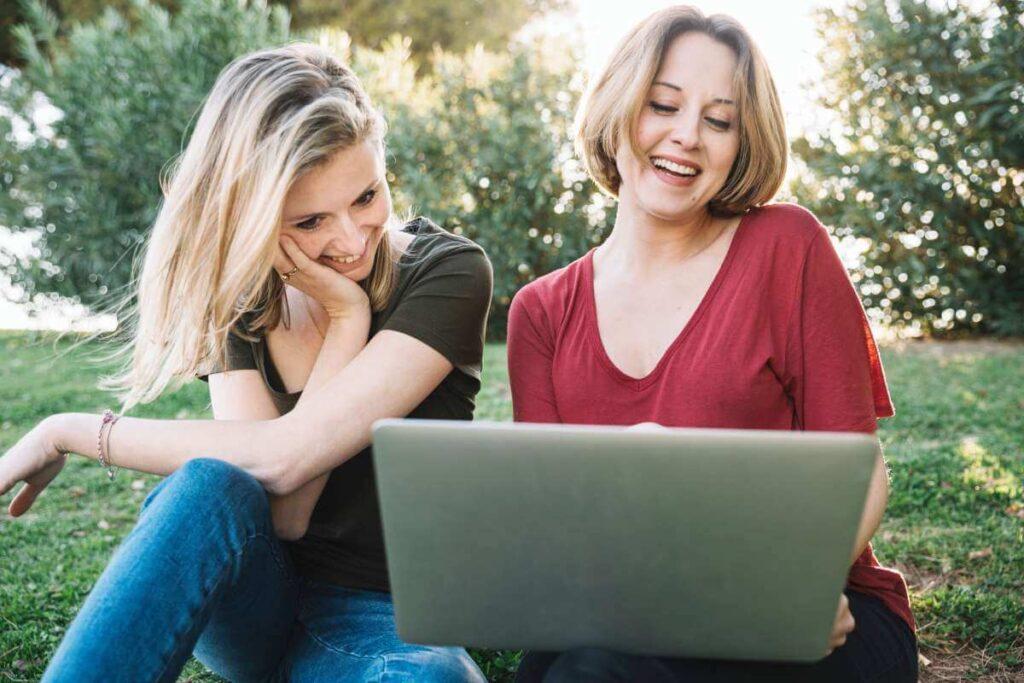 Best Friends sitting at the park studying